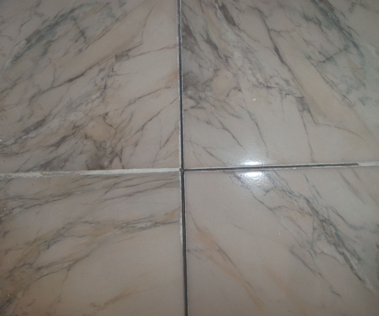 how to fix loose tiles